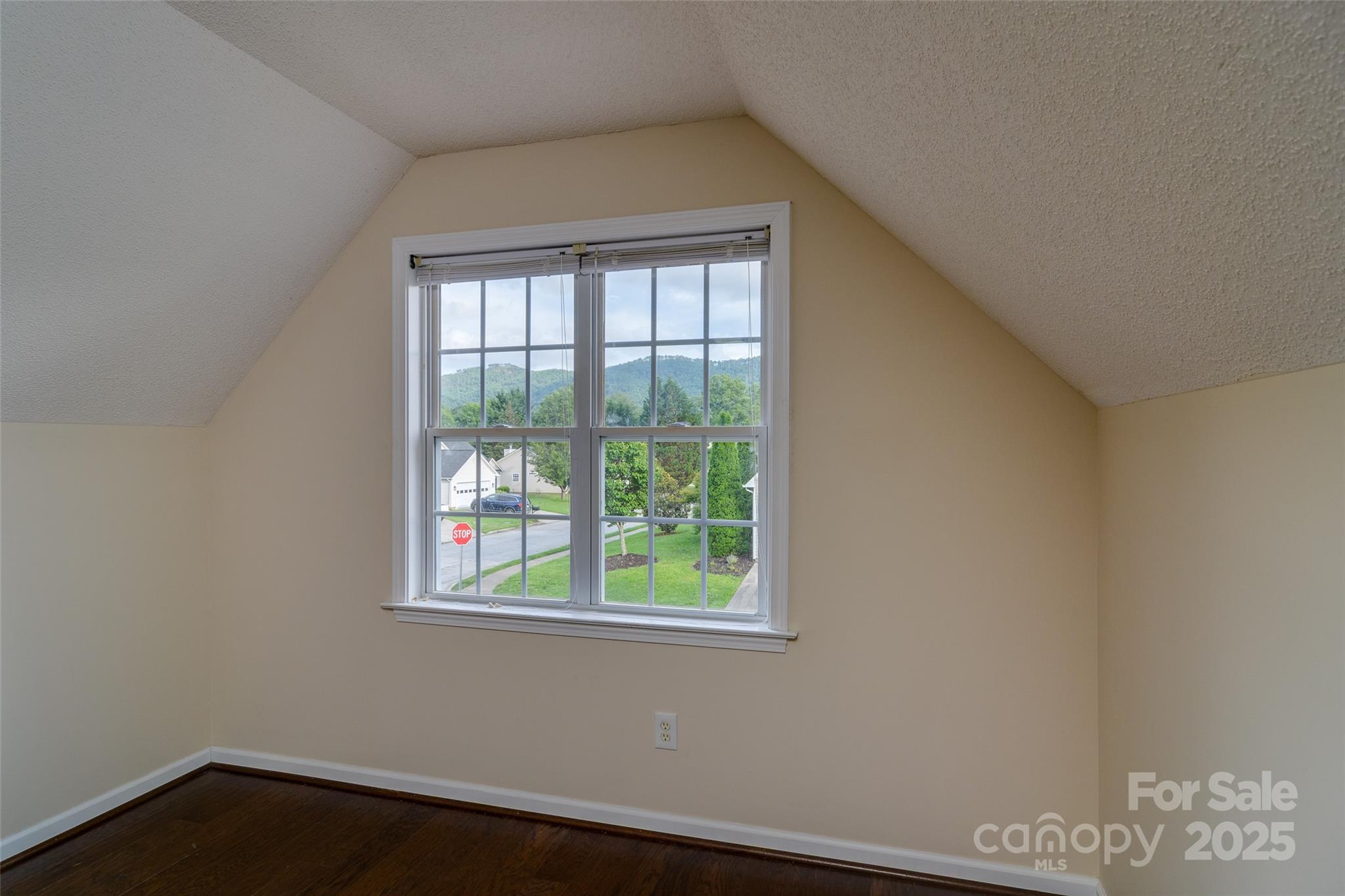 395 Running Briar Road Fletcher, NC 28732 - Photo 28 of 33 a view of a small space with wooden floor and a window