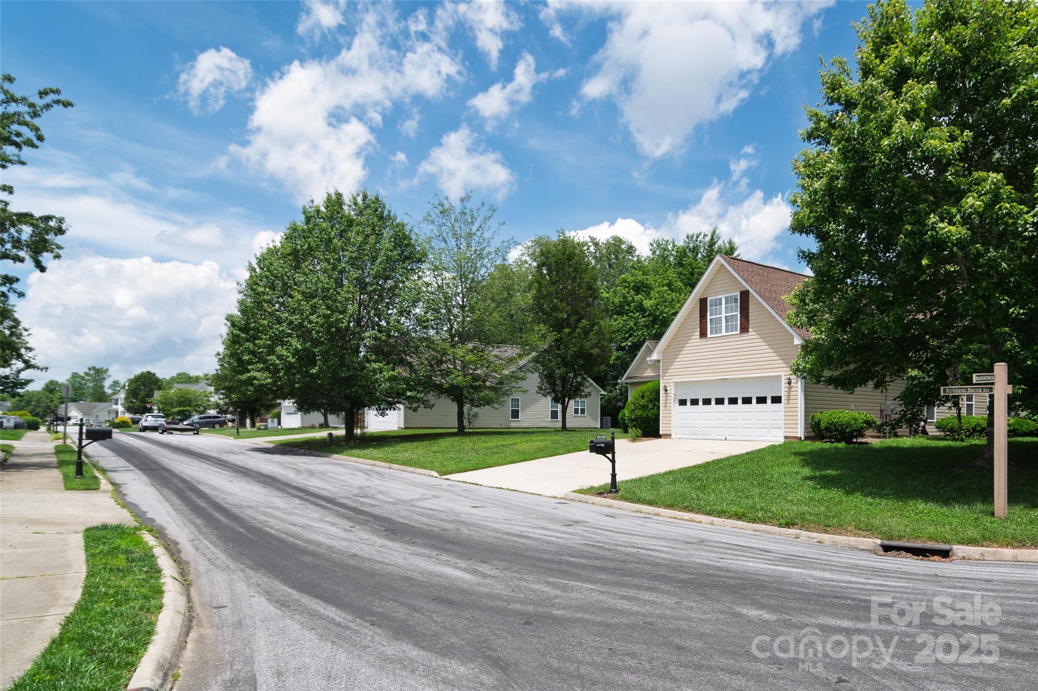 395 Running Briar Road Fletcher, NC 28732 - Photo 31 of 33 a view of a house with a yard