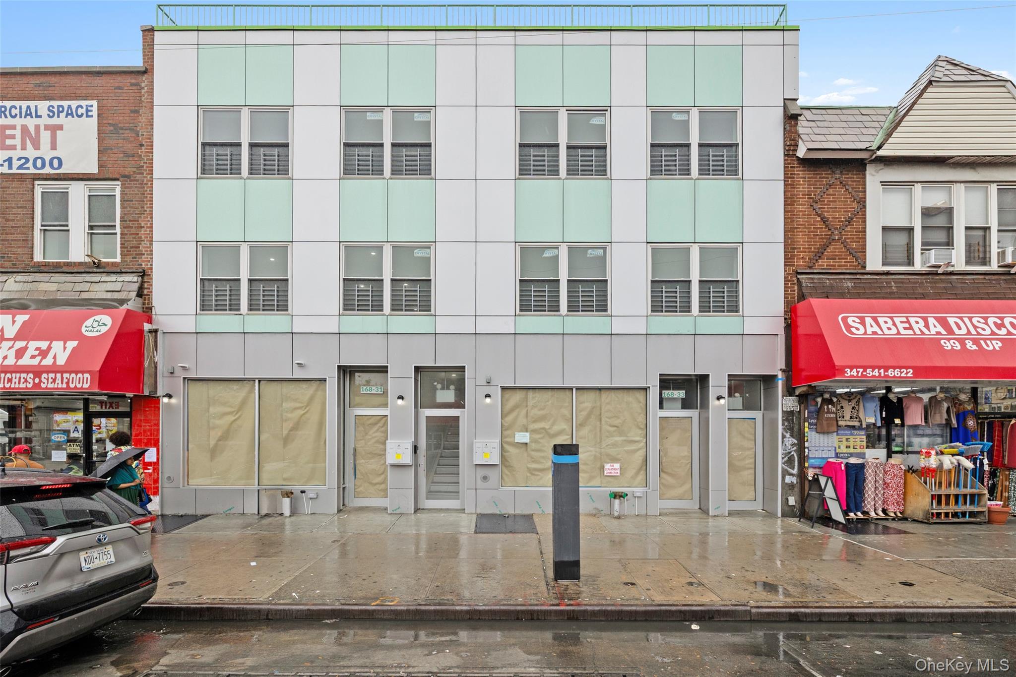 a view of a building with a street