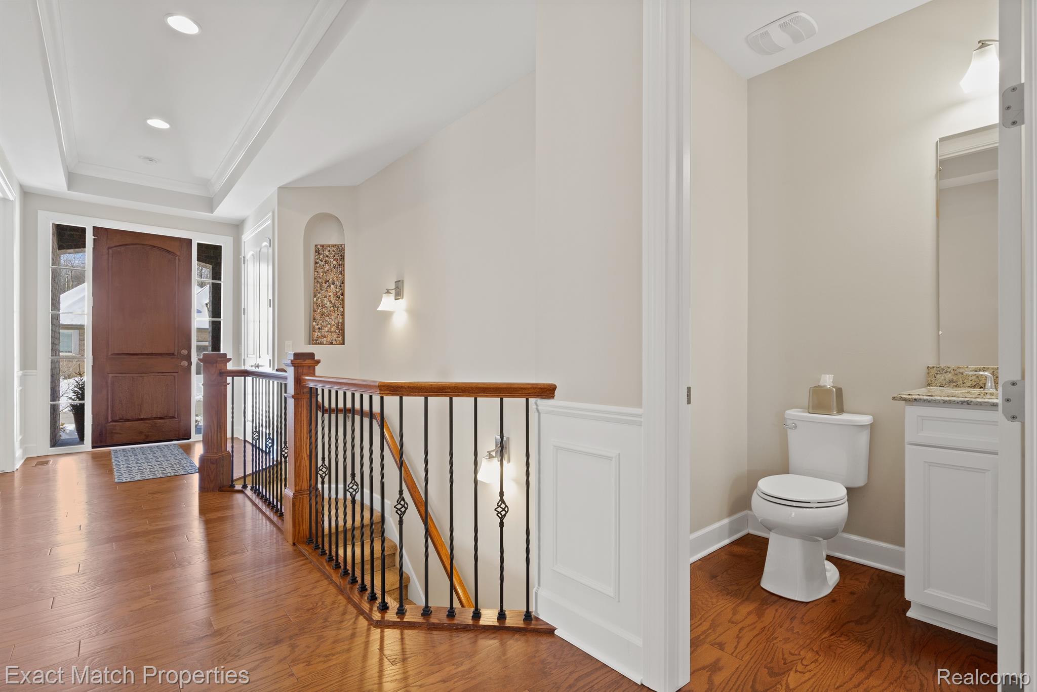 5496 Woodfall Road Clarkston, MI 48348 - Photo 13 of 51 Entry hallway with open rail and powder room