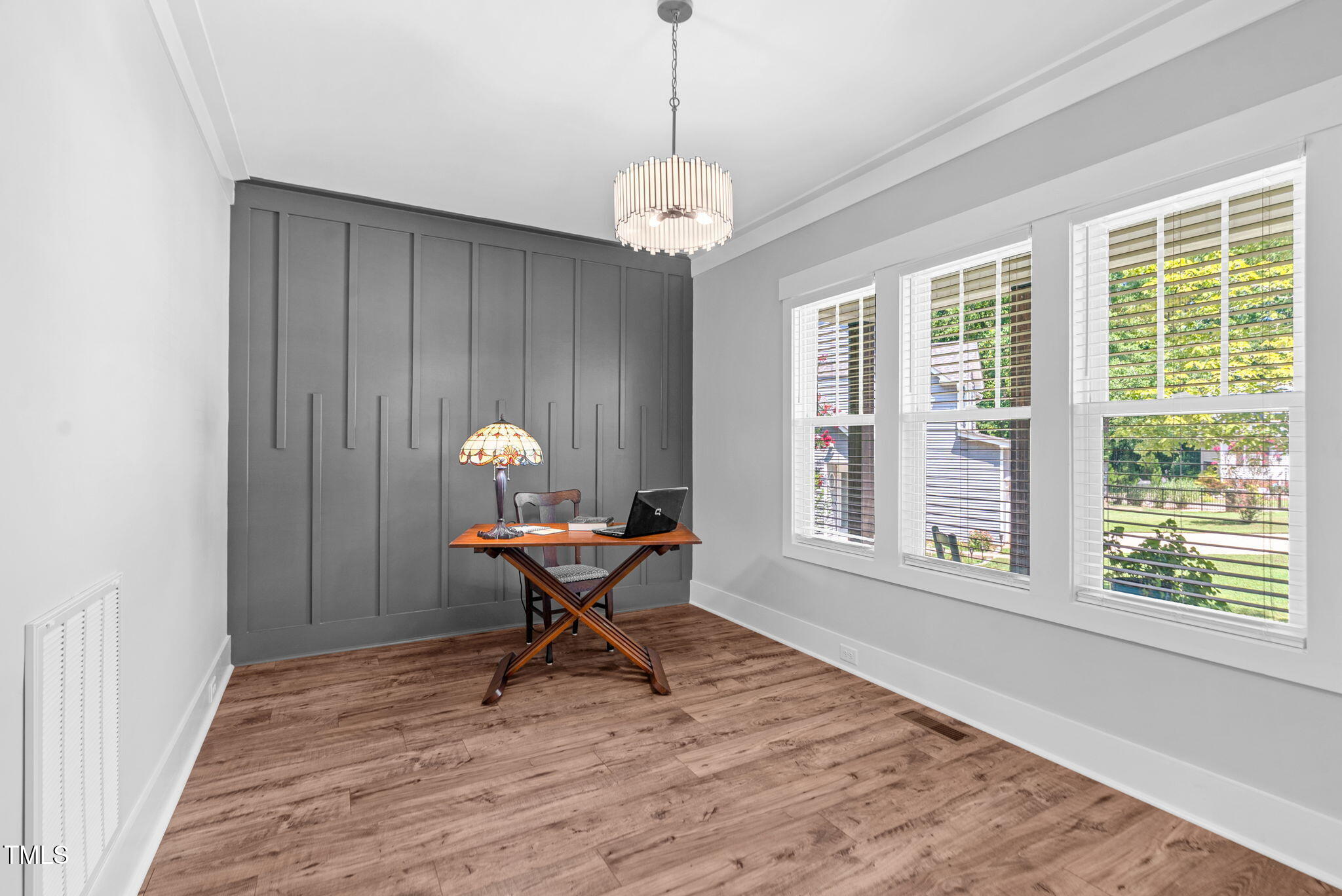 1004 Snow Peak Court Raleigh, NC 27603 - Photo 13 of 65 a work room with furniture wooden floor and a window