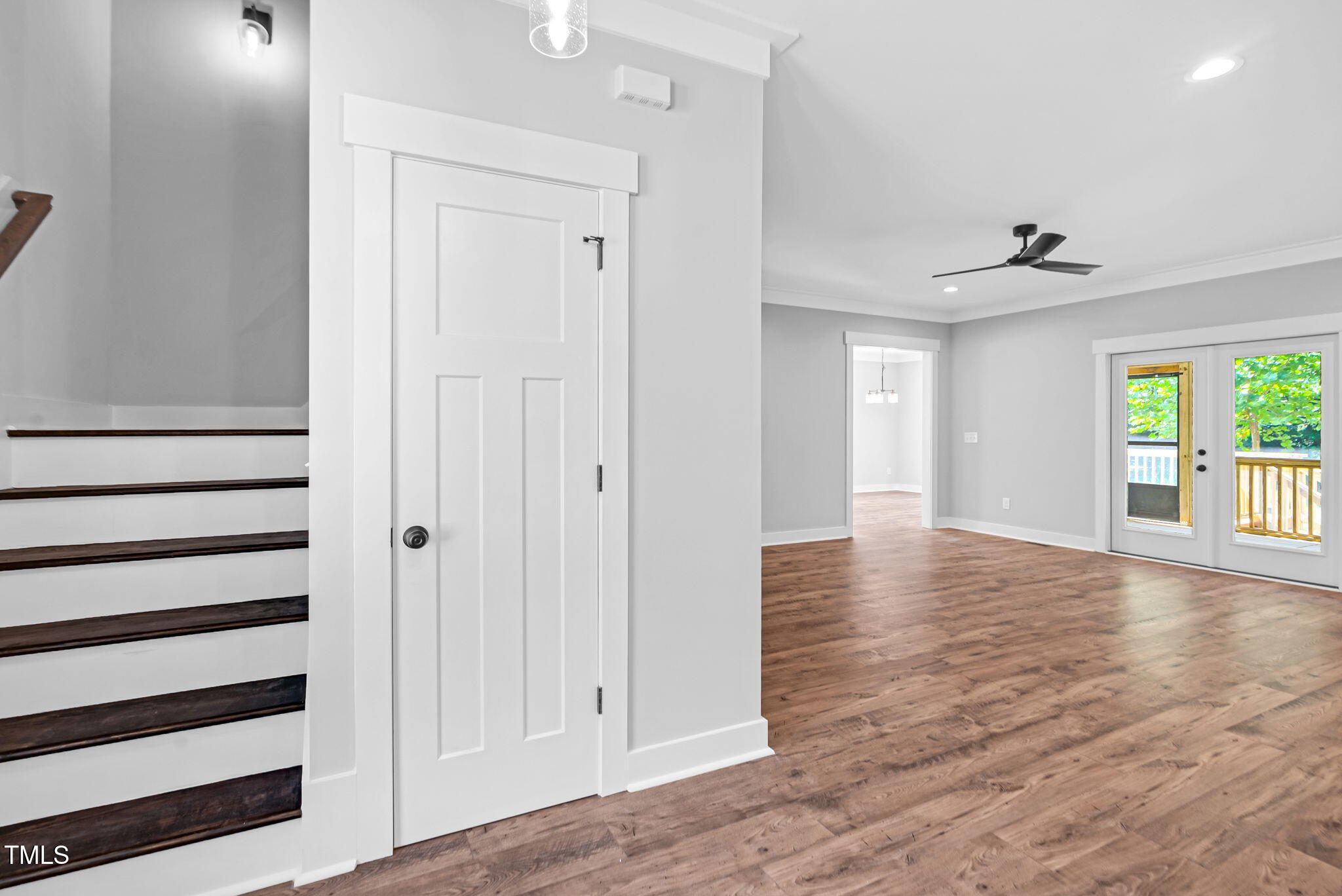 1004 Snow Peak Court Raleigh, NC 27603 - Photo 15 of 65 a view of a hallway with wooden floor and a window