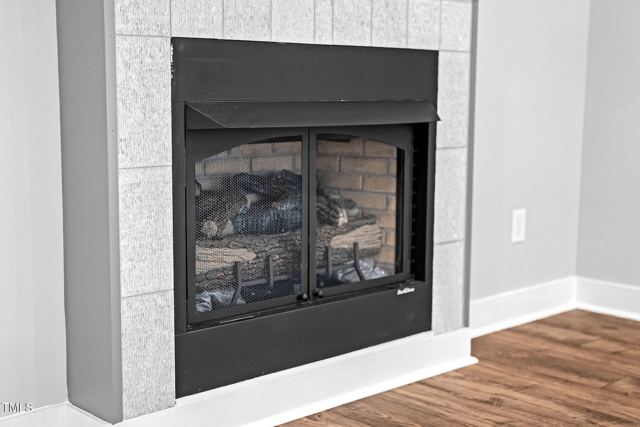 1004 Snow Peak Court Raleigh, NC 27603 - Photo 19 of 65 a living room with a fireplace