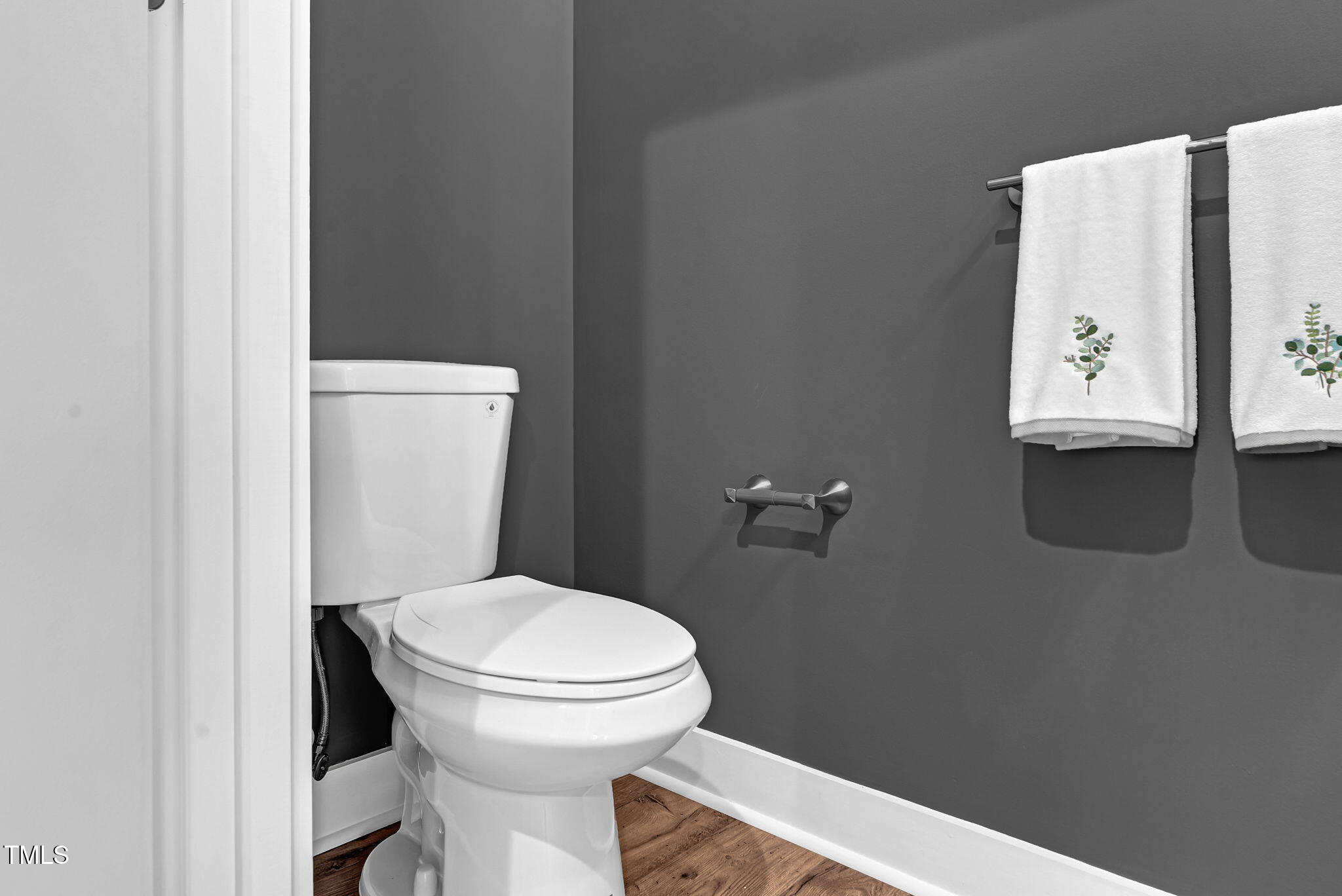 1004 Snow Peak Court Raleigh, NC 27603 - Photo 37 of 65 a bathroom with a toilet and a sink