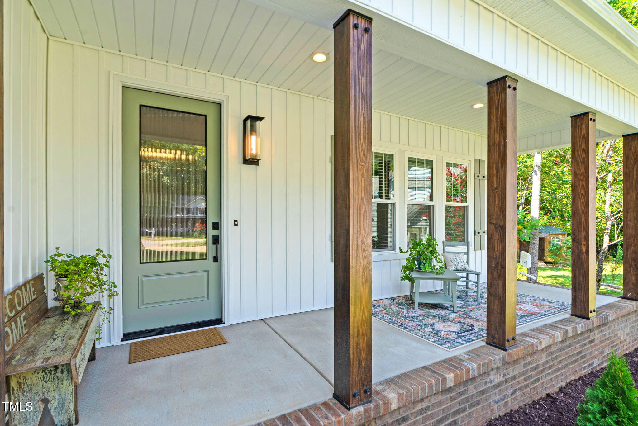1004 Snow Peak Court Raleigh, NC 27603 - Photo 3 of 65 a porch with seating space