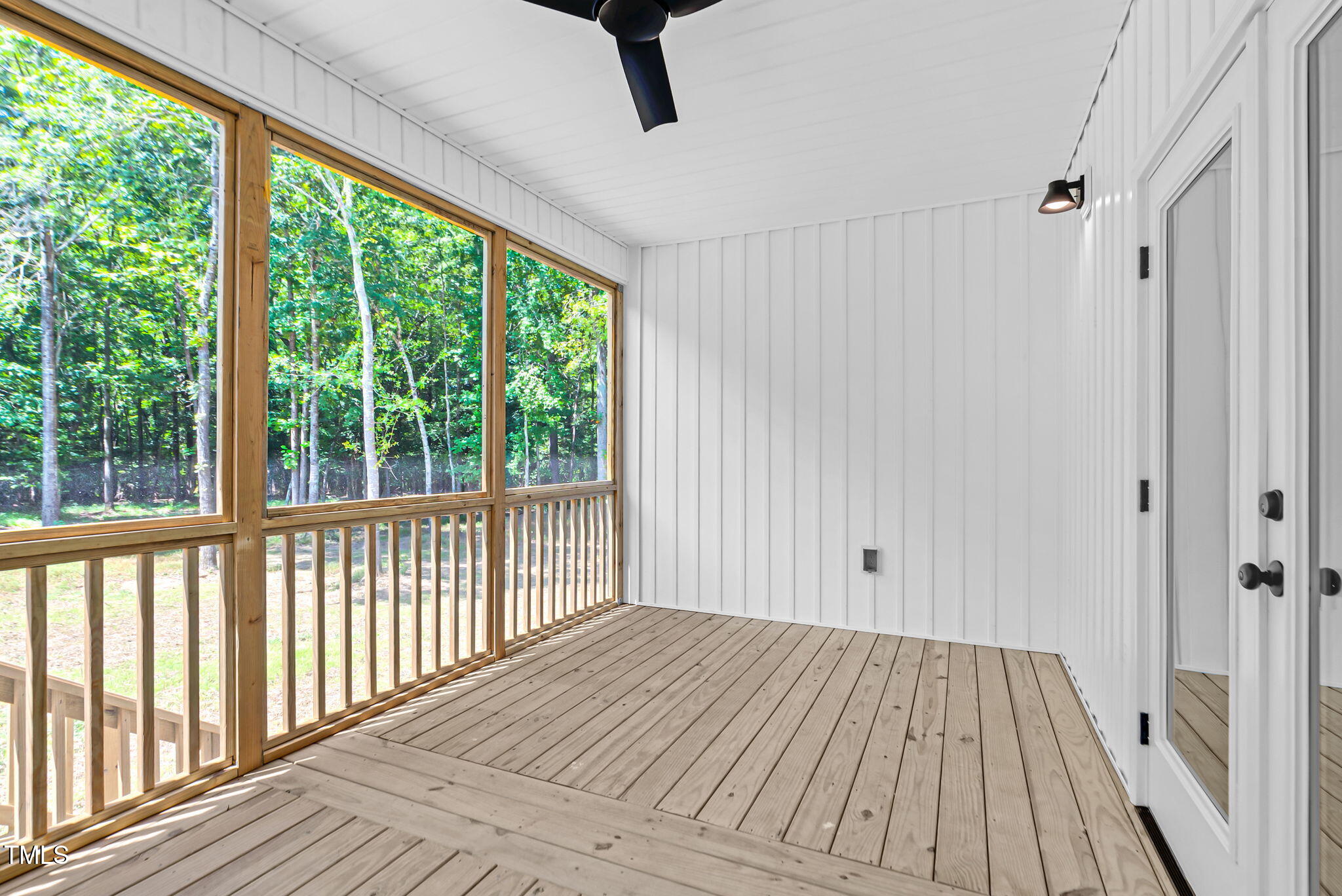 1004 Snow Peak Court Raleigh, NC 27603 - Photo 57 of 65 a view of a bedroom with wooden floor and balcony