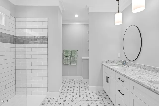 a work room with furniture wooden floor and a window