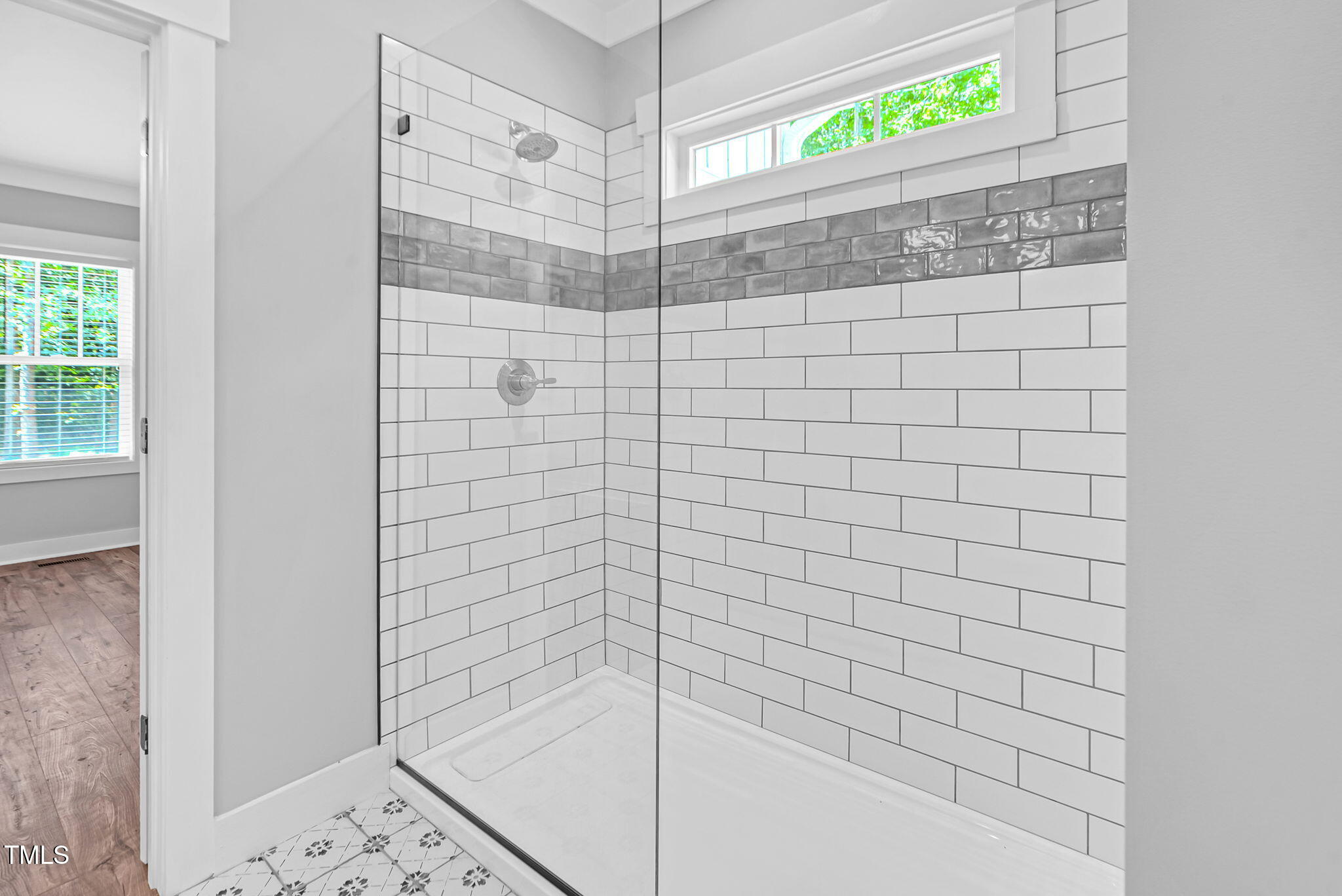 1004 Snow Peak Court Raleigh, NC 27603 - Photo 9 of 65 a bathroom with a shower