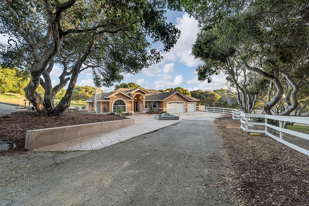 a view of house with trees in the background