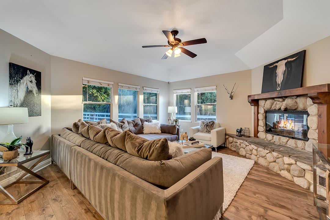 8640 Dyer Road Prunedale, CA 93907 - Photo 19 of 61 a living room with furniture and a fireplace
