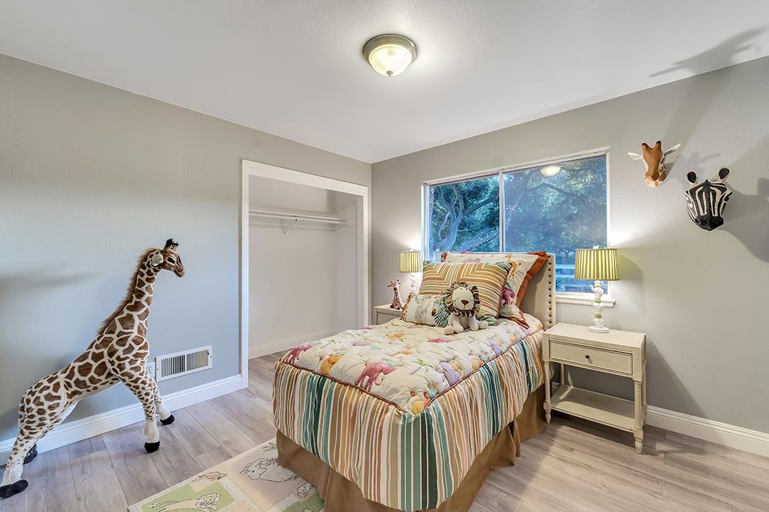 8640 Dyer Road Prunedale, CA 93907 - Photo 20 of 61 a bedroom with a bed and a window