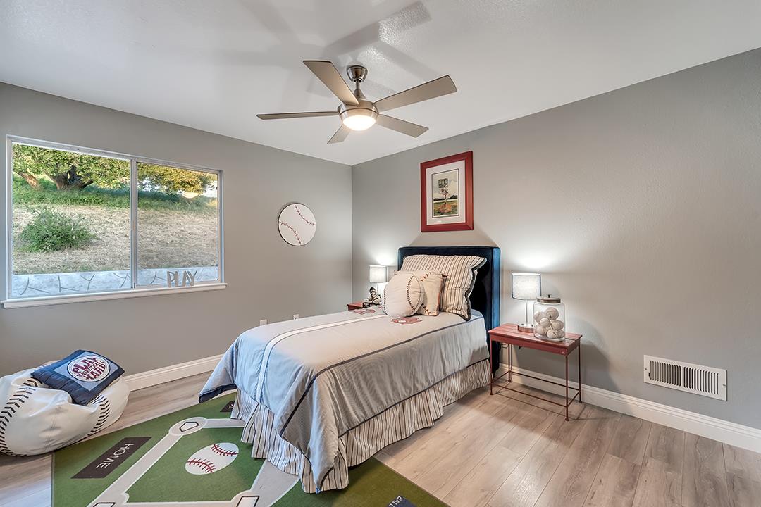 8640 Dyer Road Prunedale, CA 93907 - Photo 21 of 61 a bedroom with a bed and a window