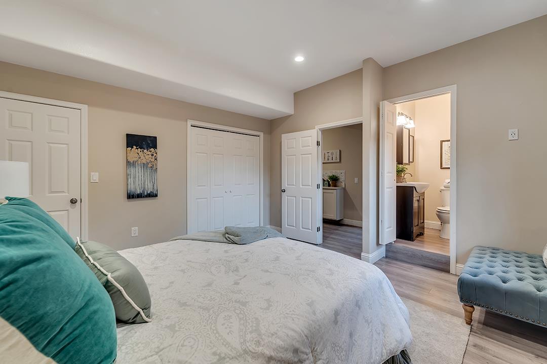 8640 Dyer Road Prunedale, CA 93907 - Photo 24 of 61 a bedroom with a bed and a couch