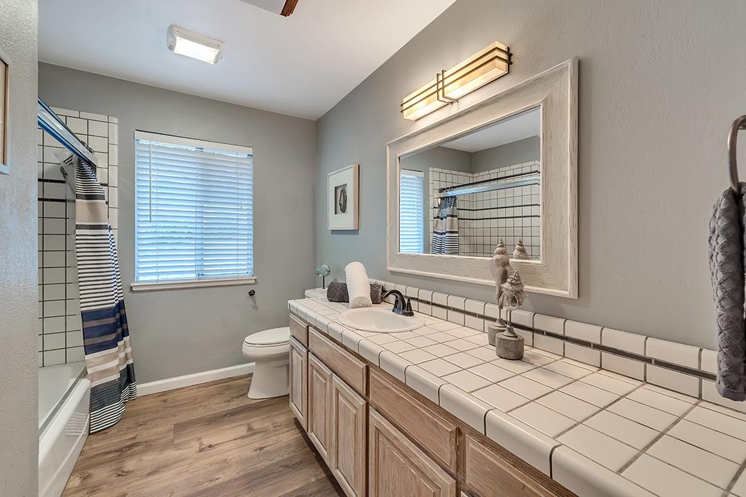 8640 Dyer Road Prunedale, CA 93907 - Photo 25 of 61 a bathroom with a sink and a mirror