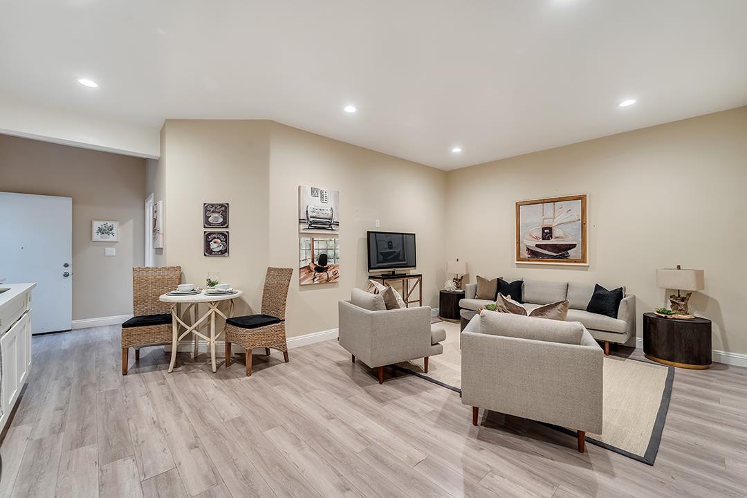 8640 Dyer Road Prunedale, CA 93907 - Photo 43 of 61 a living room with furniture and a wooden floor