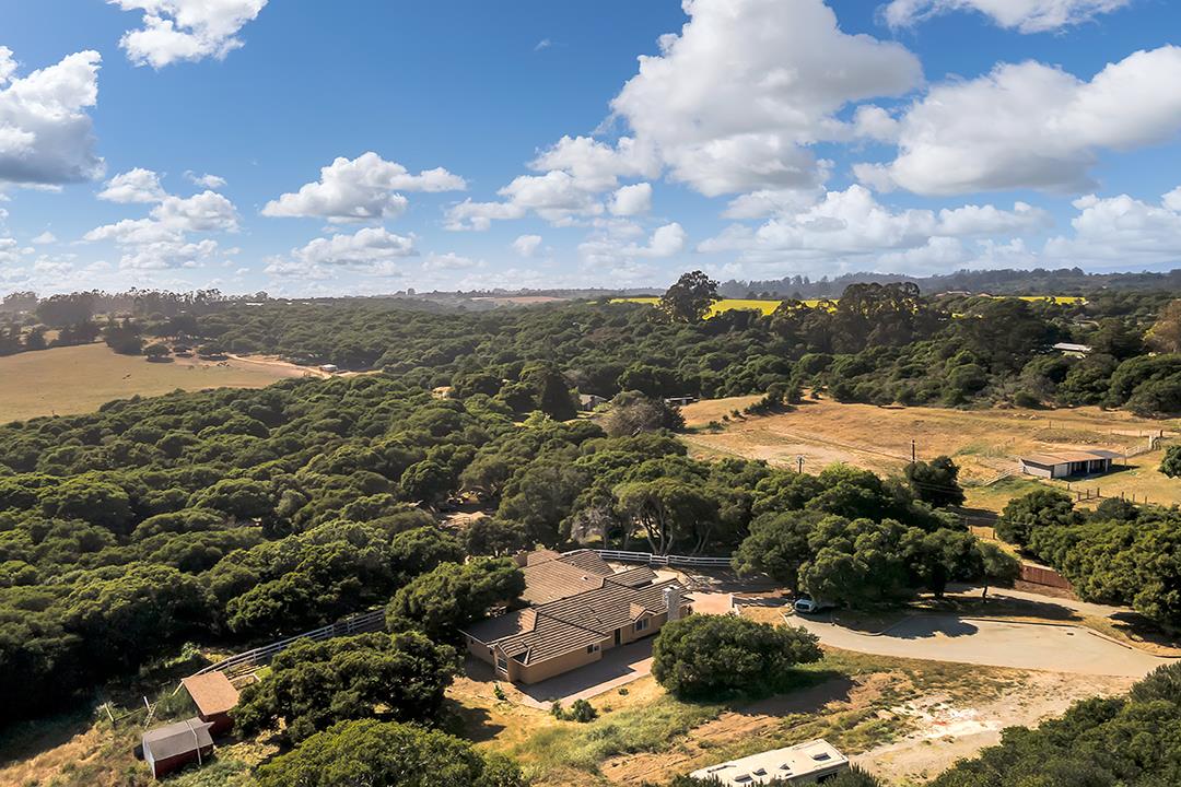 8640 Dyer Road Prunedale, CA 93907 - Photo 57 of 61 an aerial view of residential houses with outdoor space and lake view