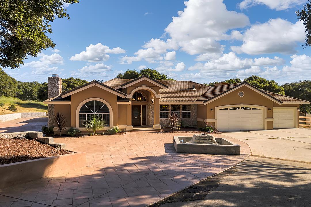 8640 Dyer Road Prunedale, CA 93907 - Photo 8 of 61 a front view of a house with a yard