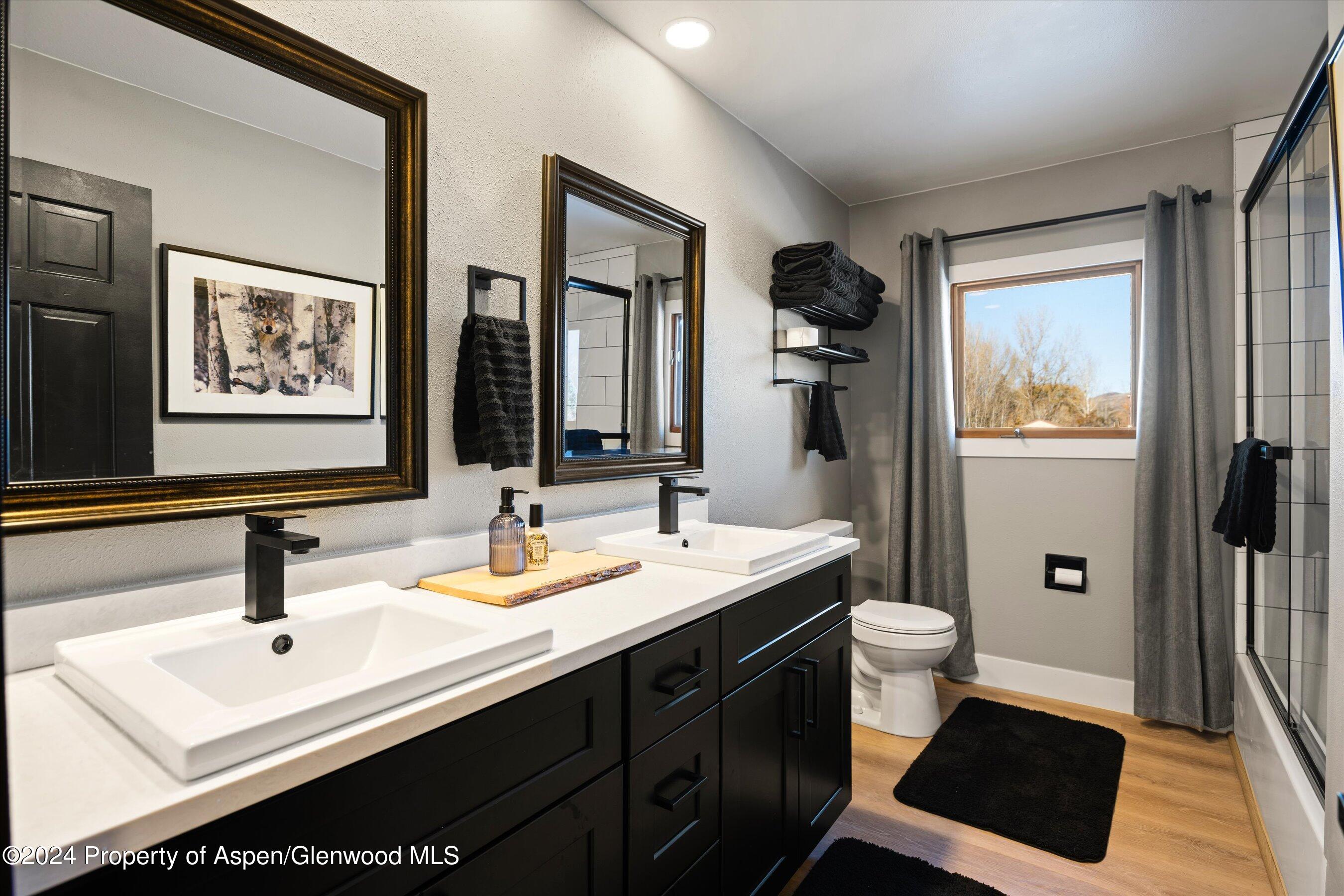 24 Cherry Lane Basalt, CO 81621 - Photo 17 of 42 a bathroom with a sink a toilet and shower