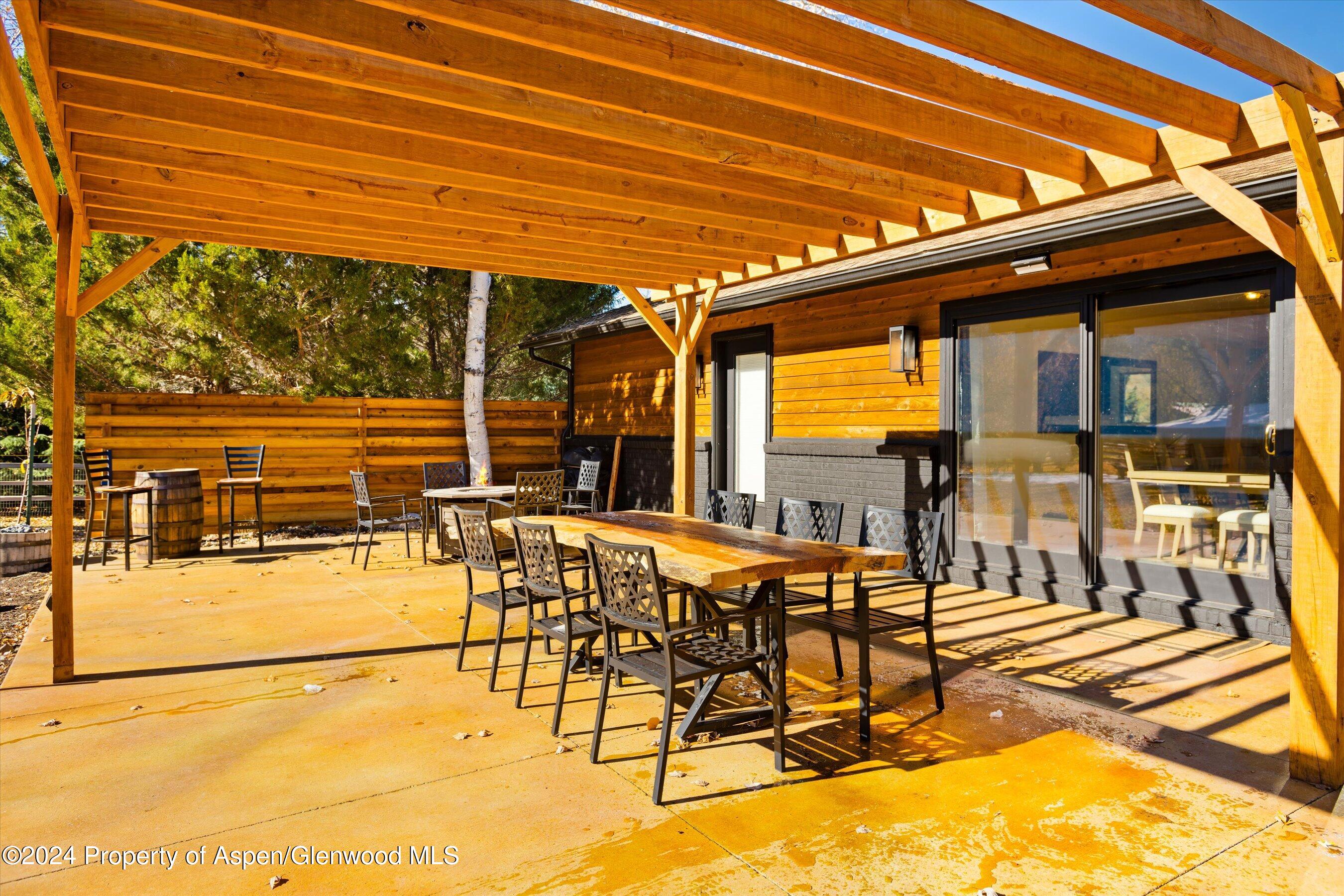 24 Cherry Lane Basalt, CO 81621 - Photo 20 of 42 a patio with glass top table and chairs