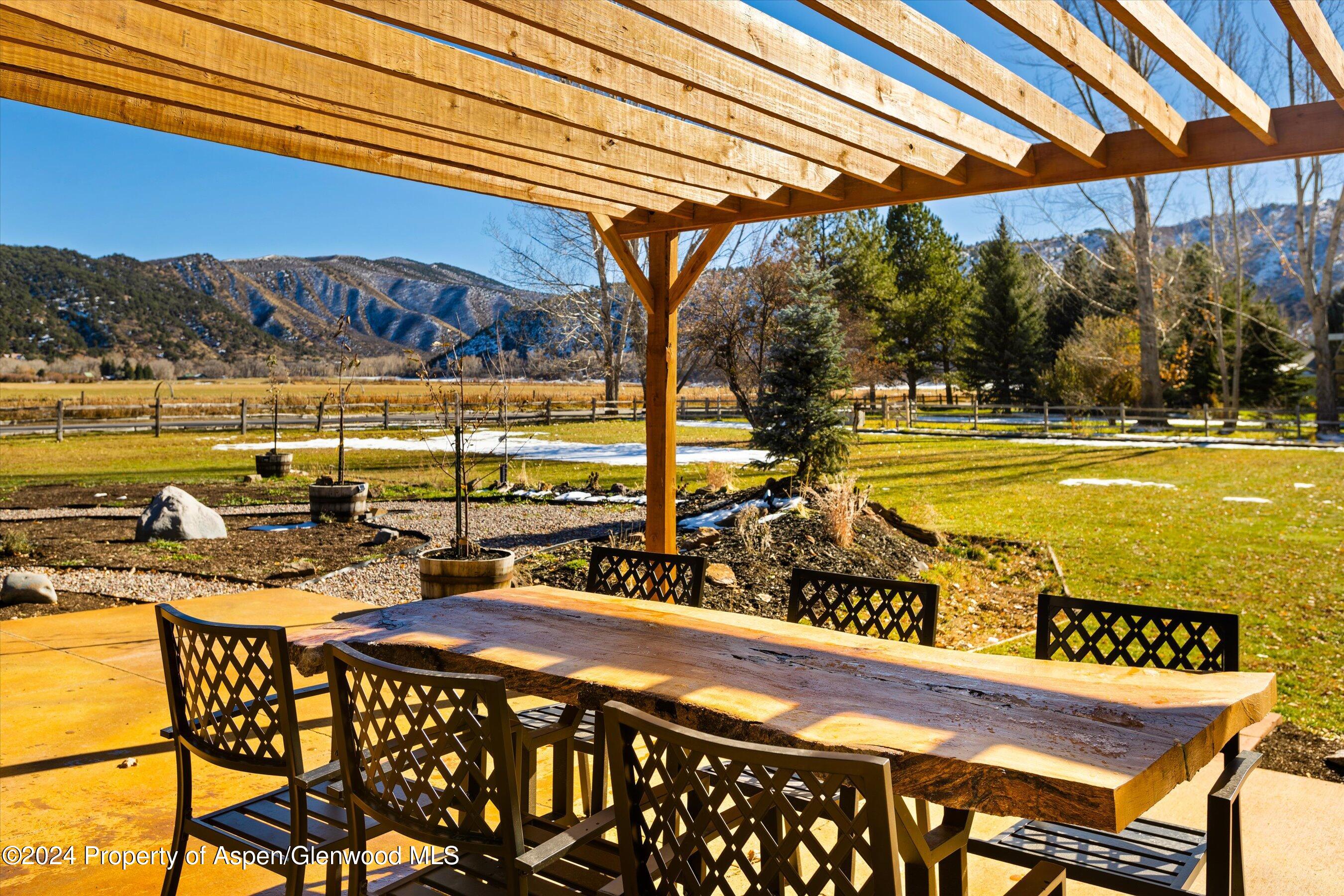 24 Cherry Lane Basalt, CO 81621 - Photo 21 of 42 a view of a swimming pool with an outdoor seating