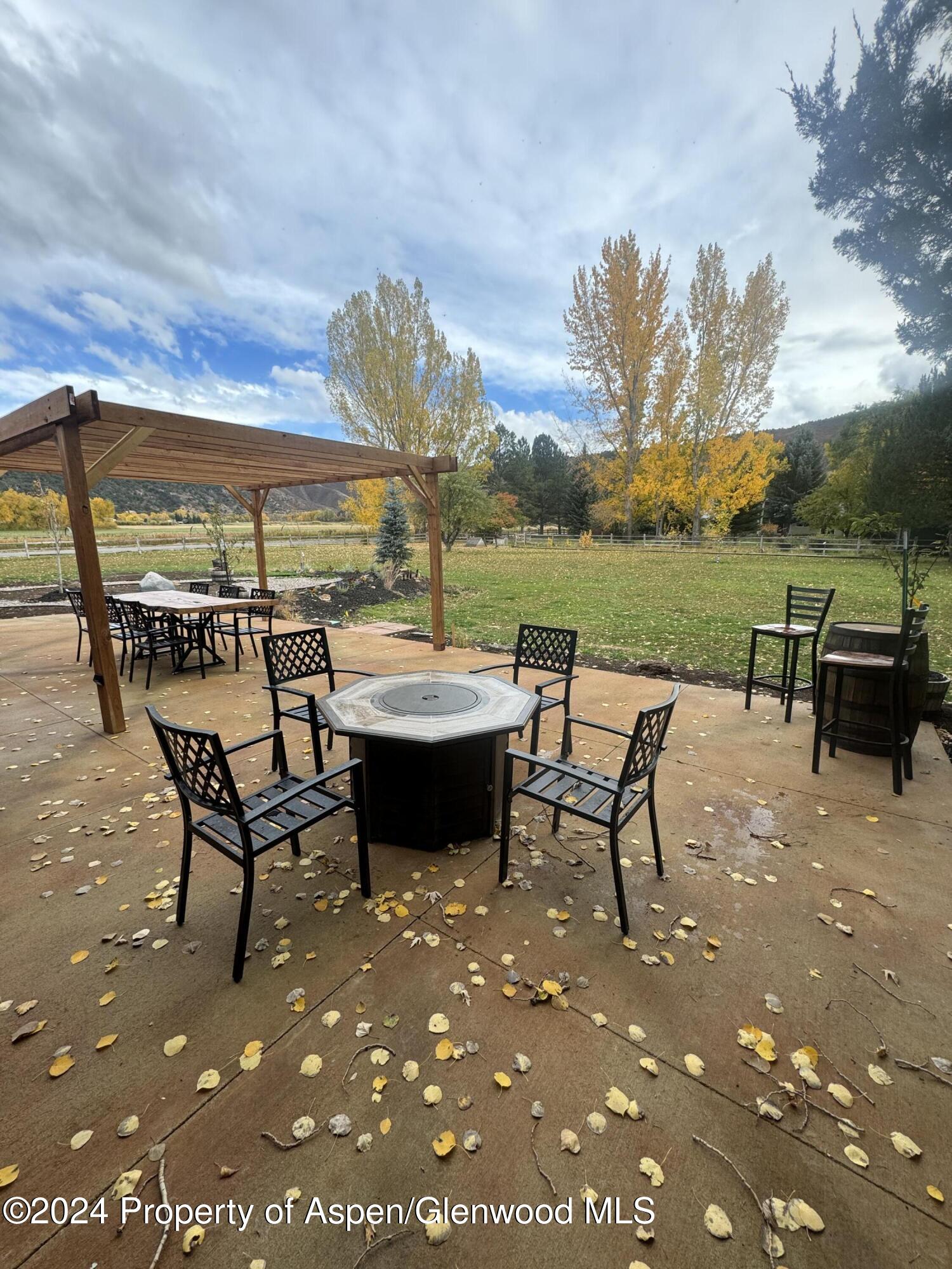24 Cherry Lane Basalt, CO 81621 - Photo 33 of 42 a view of a patio with a table and chairs