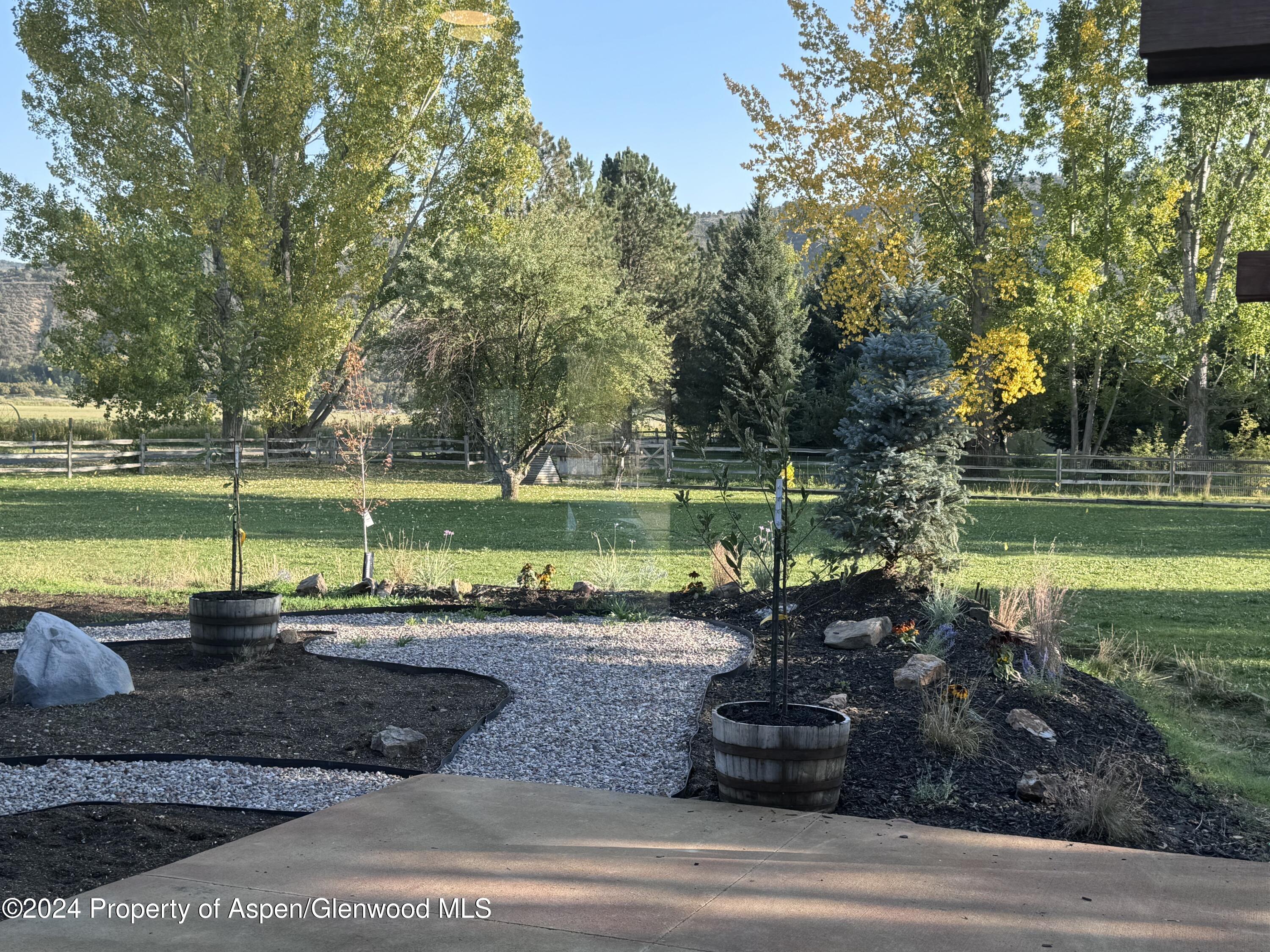 24 Cherry Lane Basalt, CO 81621 - Photo 38 of 42 a view of a swimming pool and a lake