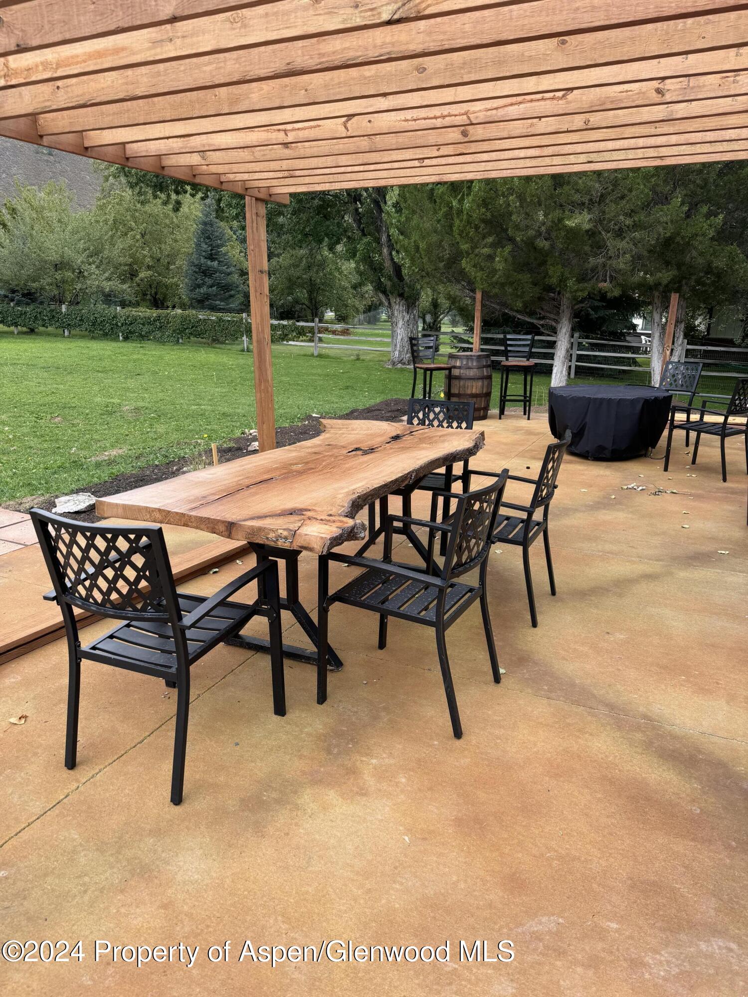 24 Cherry Lane Basalt, CO 81621 - Photo 41 of 42 a view of a patio with a table chairs and a table