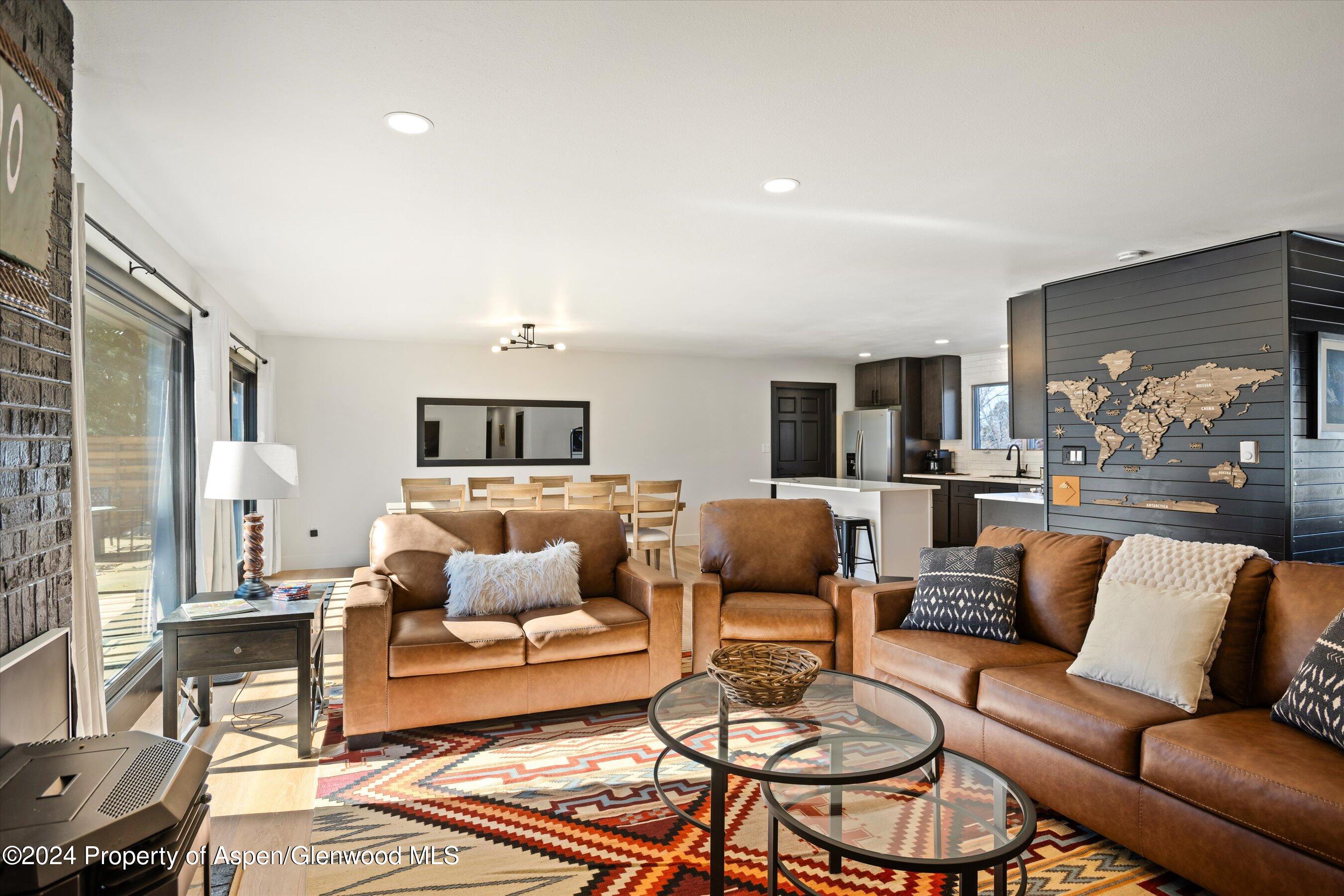 24 Cherry Lane Basalt, CO 81621 - Photo 6 of 42 a living room with furniture and a large window