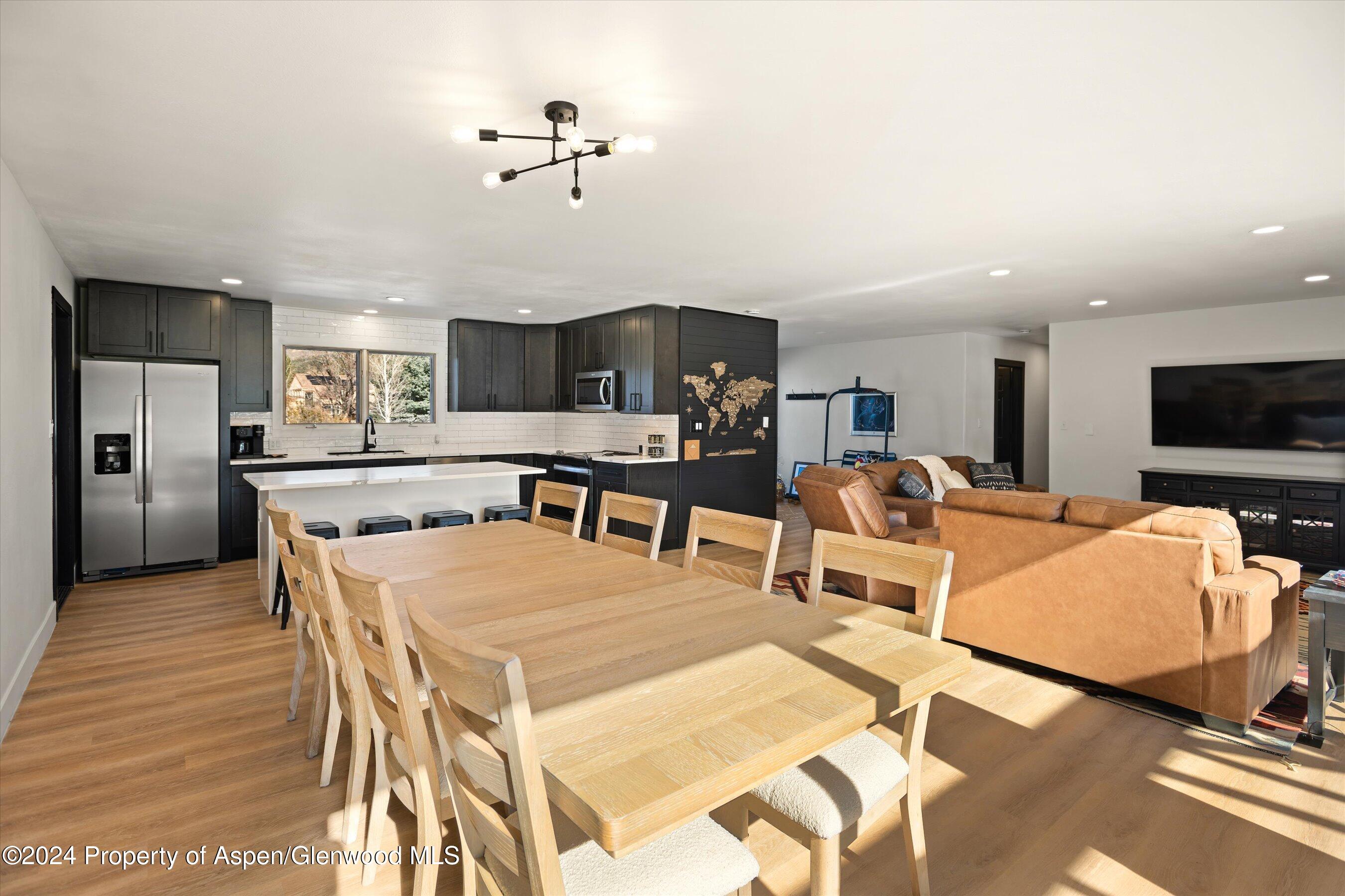 24 Cherry Lane Basalt, CO 81621 - Photo 10 of 42 a large kitchen with a table and chairs