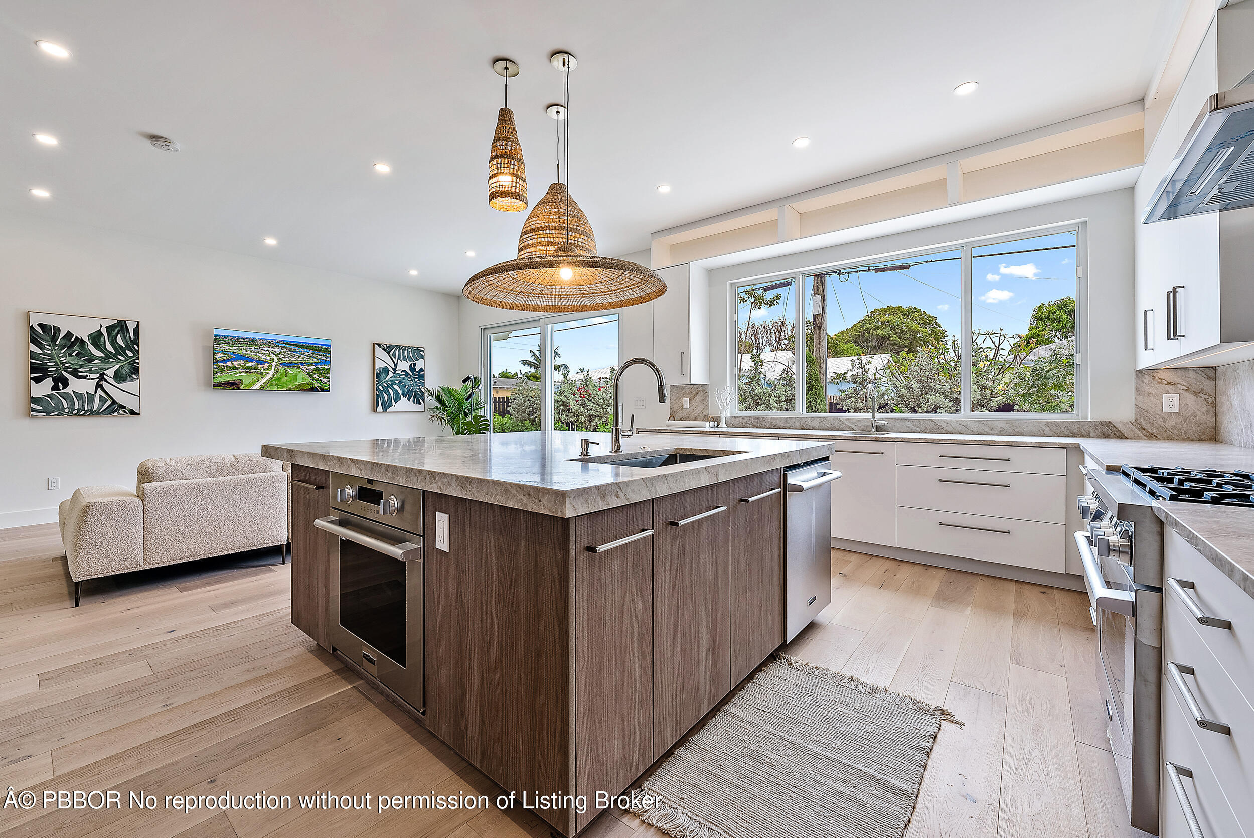 310 Edmor Road West Palm Beach, FL 33405 - Photo 13 of 32 a kitchen with stainless steel appliances a sink and a stove