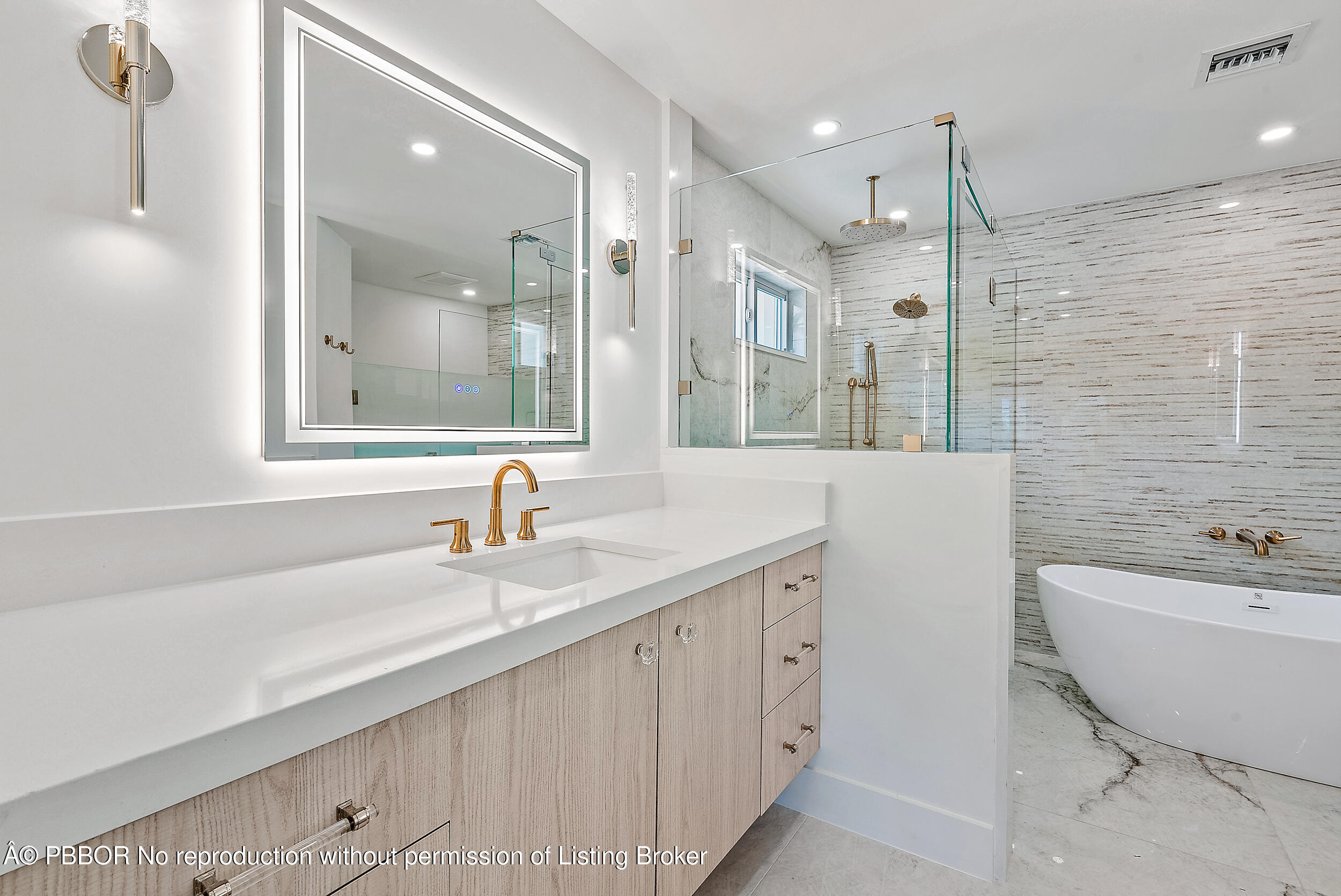 310 Edmor Road West Palm Beach, FL 33405 - Photo 19 of 32 a bathroom with a double vanity sink mirror and bathtub