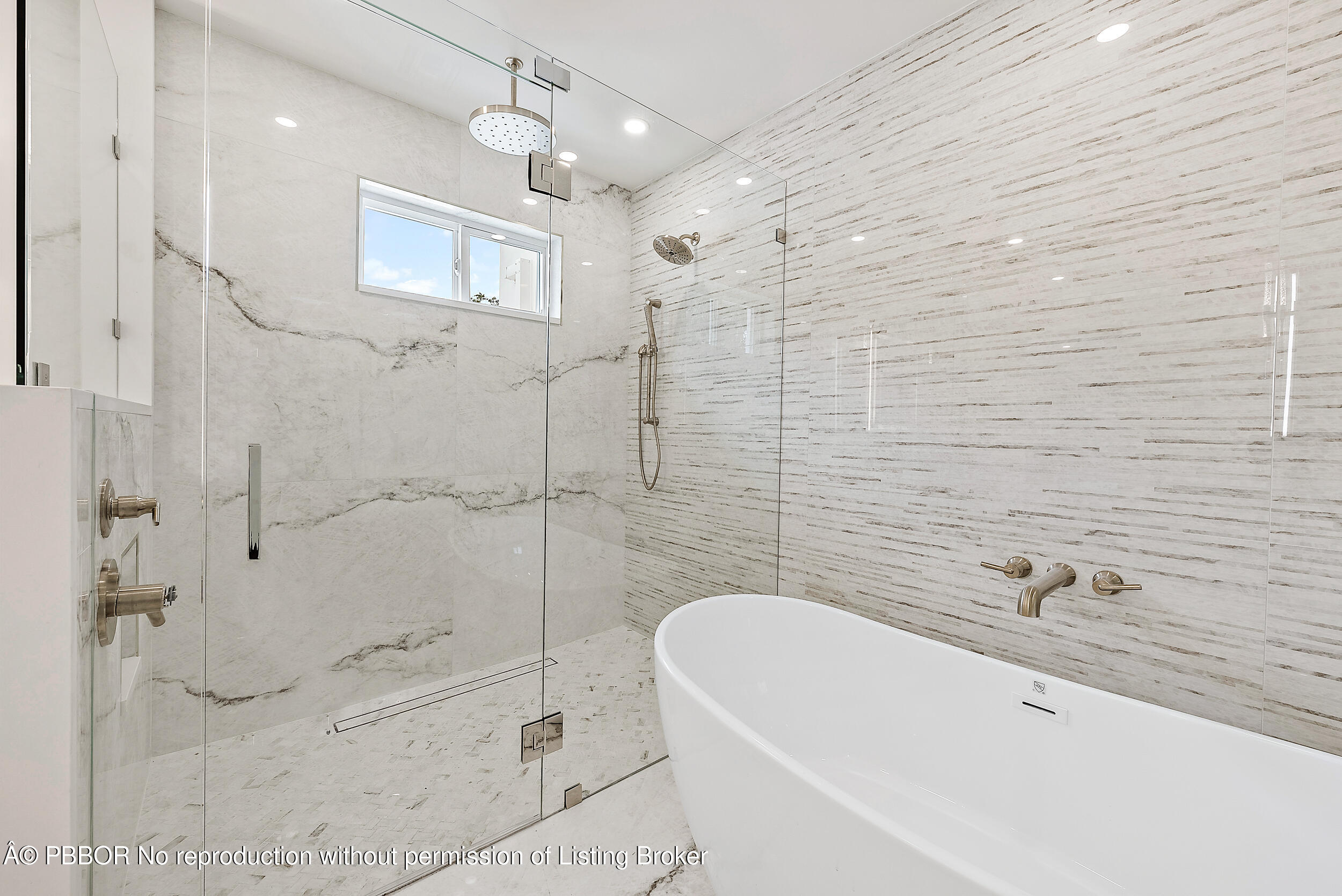 310 Edmor Road West Palm Beach, FL 33405 - Photo 21 of 32 a bathroom with a bathtub and shower