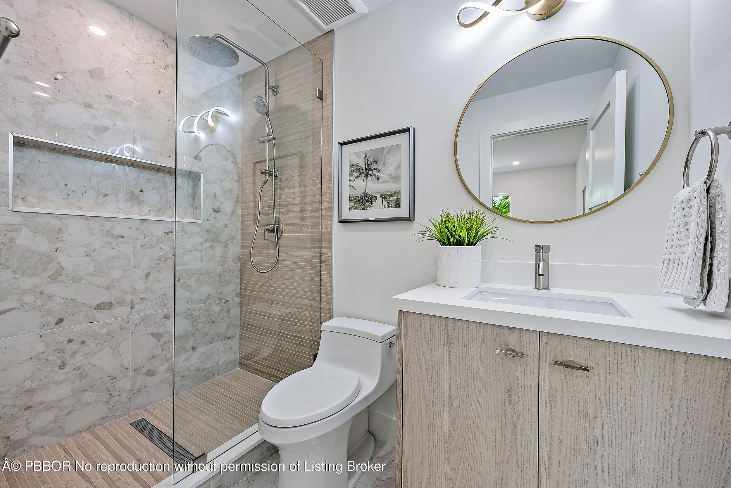 310 Edmor Road West Palm Beach, FL 33405 - Photo 25 of 32 a bathroom with a toilet sink and mirror