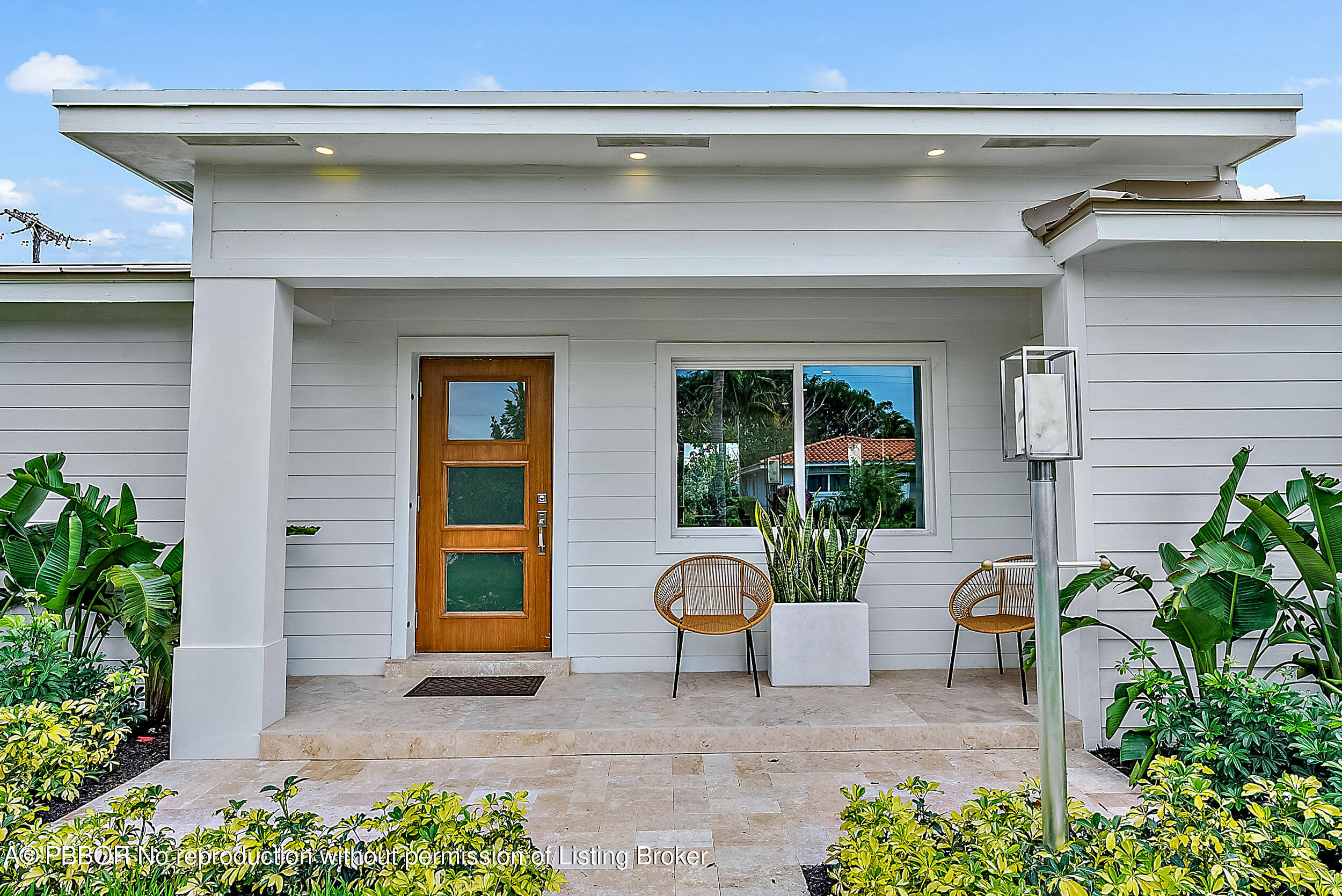 310 Edmor Road West Palm Beach, FL 33405 - Photo 3 of 32 a house view with a outdoor space