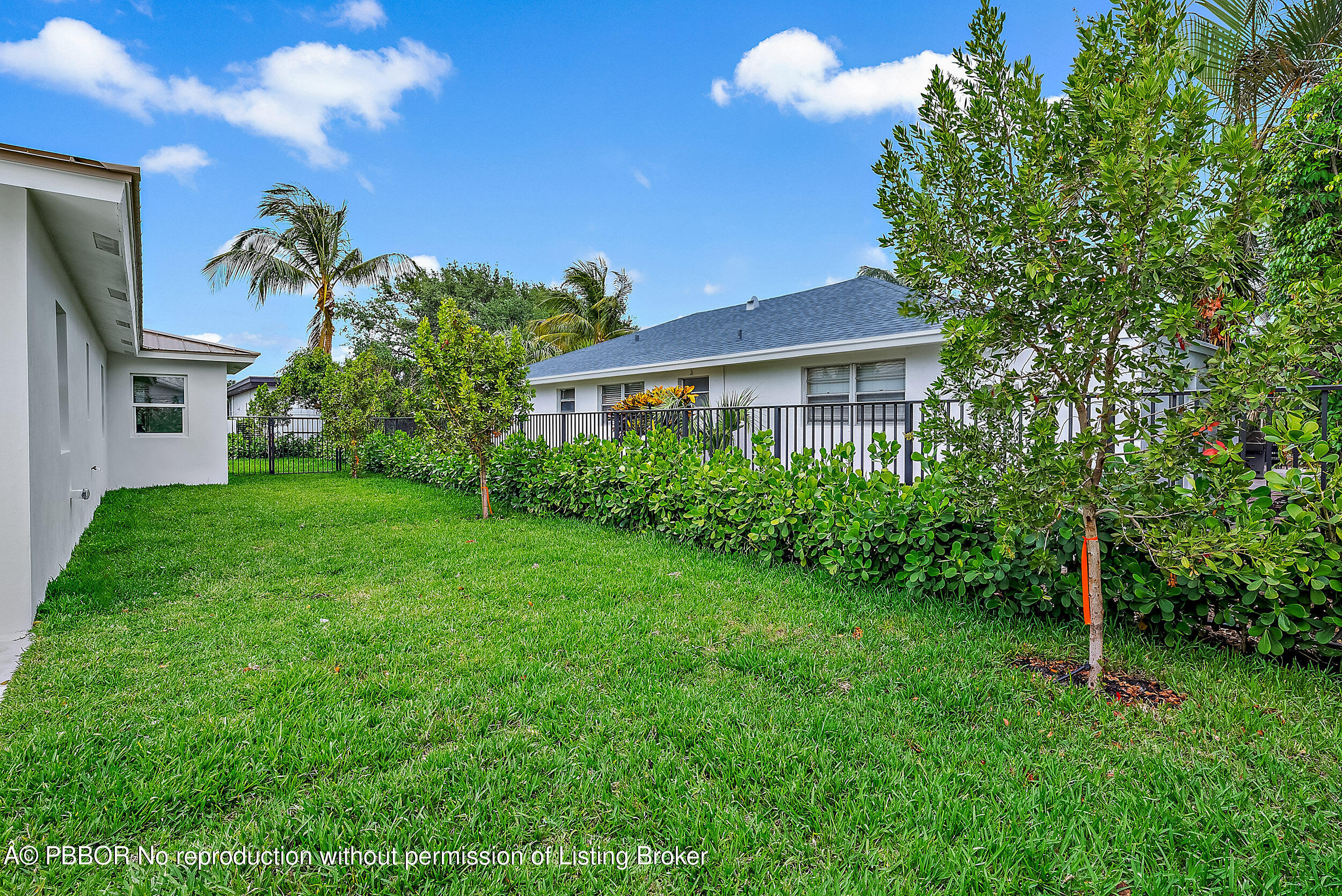 310 Edmor Road West Palm Beach, FL 33405 - Photo 32 of 32 a view of a house with a backyard