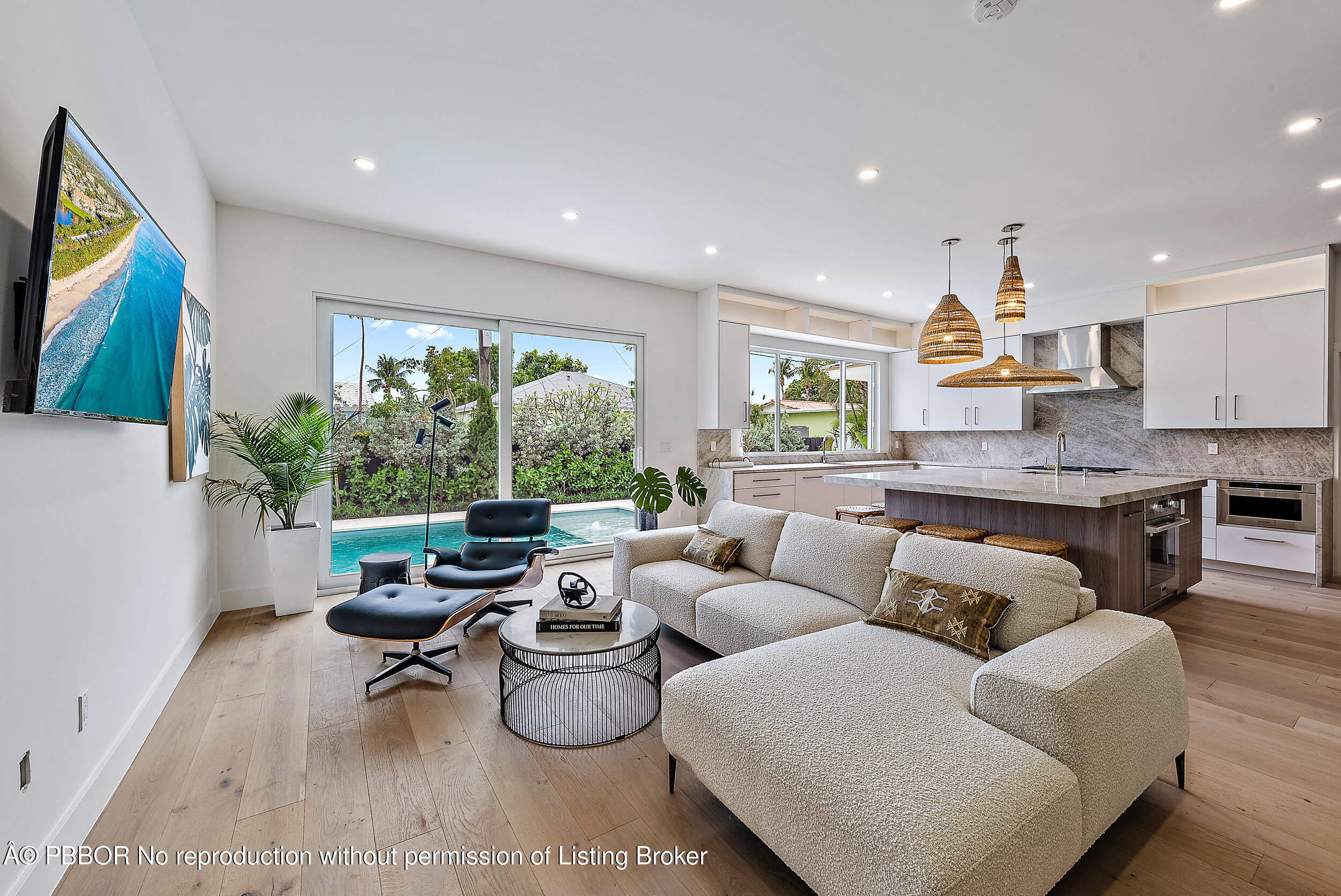 310 Edmor Road West Palm Beach, FL 33405 - Photo 8 of 32 a living room with furniture and a large window