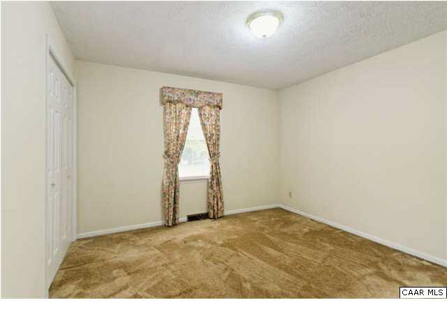 4750 Mechunk Road Keswick, VA 22947 - Photo 13 of 23 a view of an empty room and window