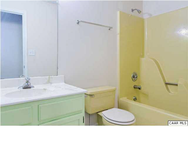 4750 Mechunk Road Keswick, VA 22947 - Photo 14 of 23 a bathroom with a sink toilet and shower