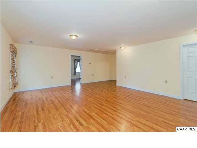 4750 Mechunk Road Keswick, VA 22947 - Photo 17 of 23 a view of empty room with wooden floor