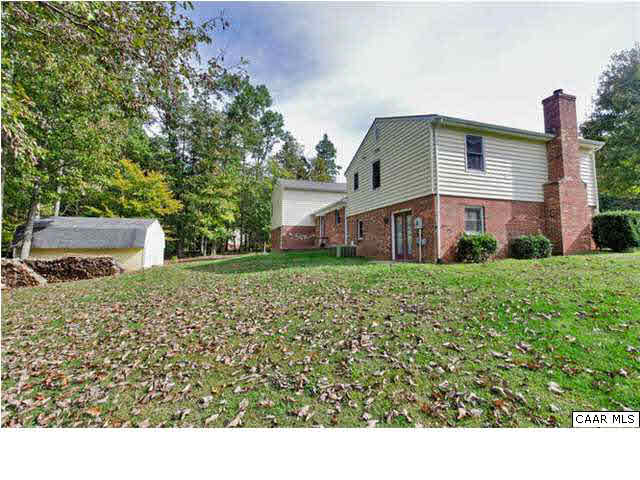 4750 Mechunk Road Keswick, VA 22947 - Photo 20 of 23 a view of a house with a garden