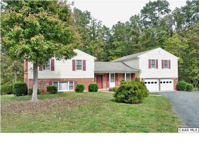 4750 Mechunk Road Keswick, VA 22947 - Photo 2 of 23 a view of a house with a yard and plants