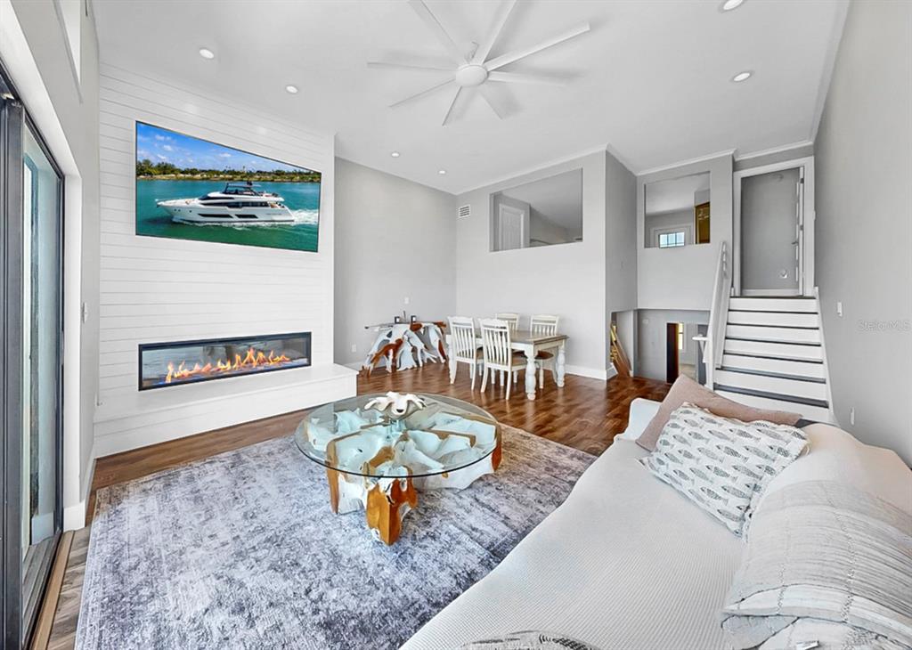 6504 Surfside Boulevard, Unit 4 Apollo Beach, FL 33572 - Photo 11 of 41 a living room with furniture and wooden floor