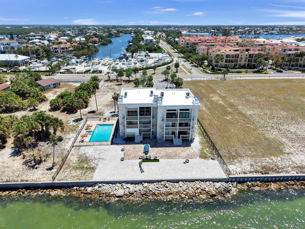 6504 Surfside Boulevard, Unit 4 Apollo Beach, FL 33572 - Photo 35 of 41 an aerial view of a house with a ocean view