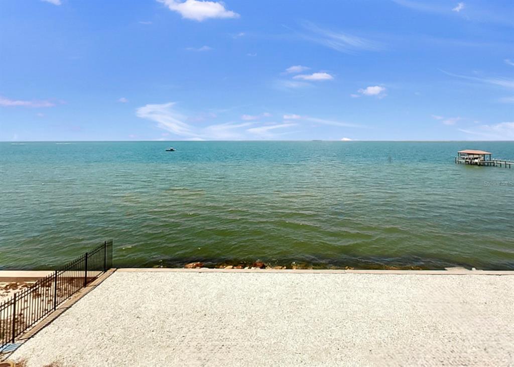 6504 Surfside Boulevard, Unit 4 Apollo Beach, FL 33572 - Photo 38 of 41 a view of beach and ocean