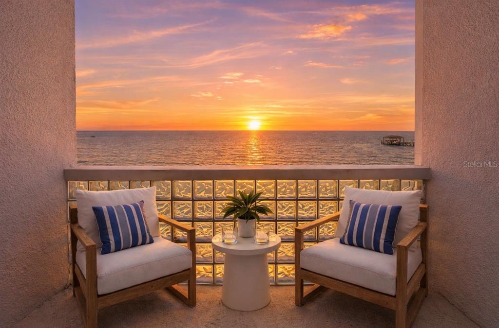 6504 Surfside Boulevard, Unit 4 Apollo Beach, FL 33572 - Photo 6 of 41 a roof deck with couches and potted plants
