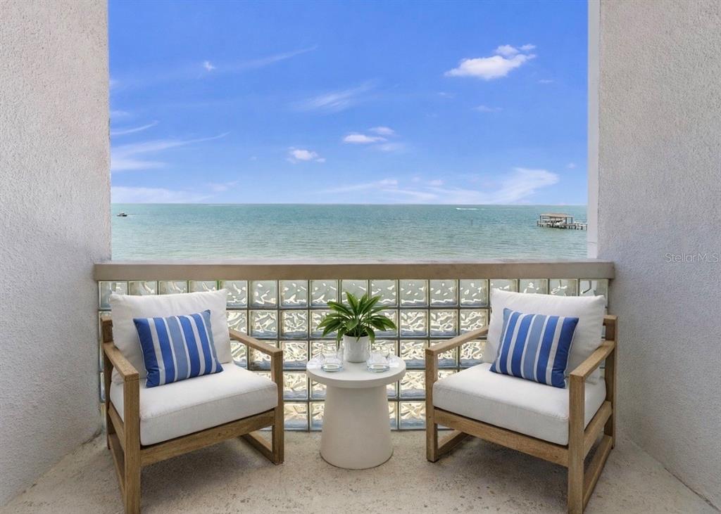 6504 Surfside Boulevard, Unit 4 Apollo Beach, FL 33572 - Photo 7 of 41 a view of a couch in the patio