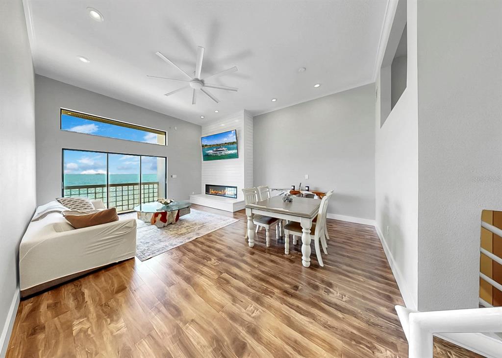 6504 Surfside Boulevard, Unit 4 Apollo Beach, FL 33572 - Photo 9 of 41 a living room with furniture and a large window