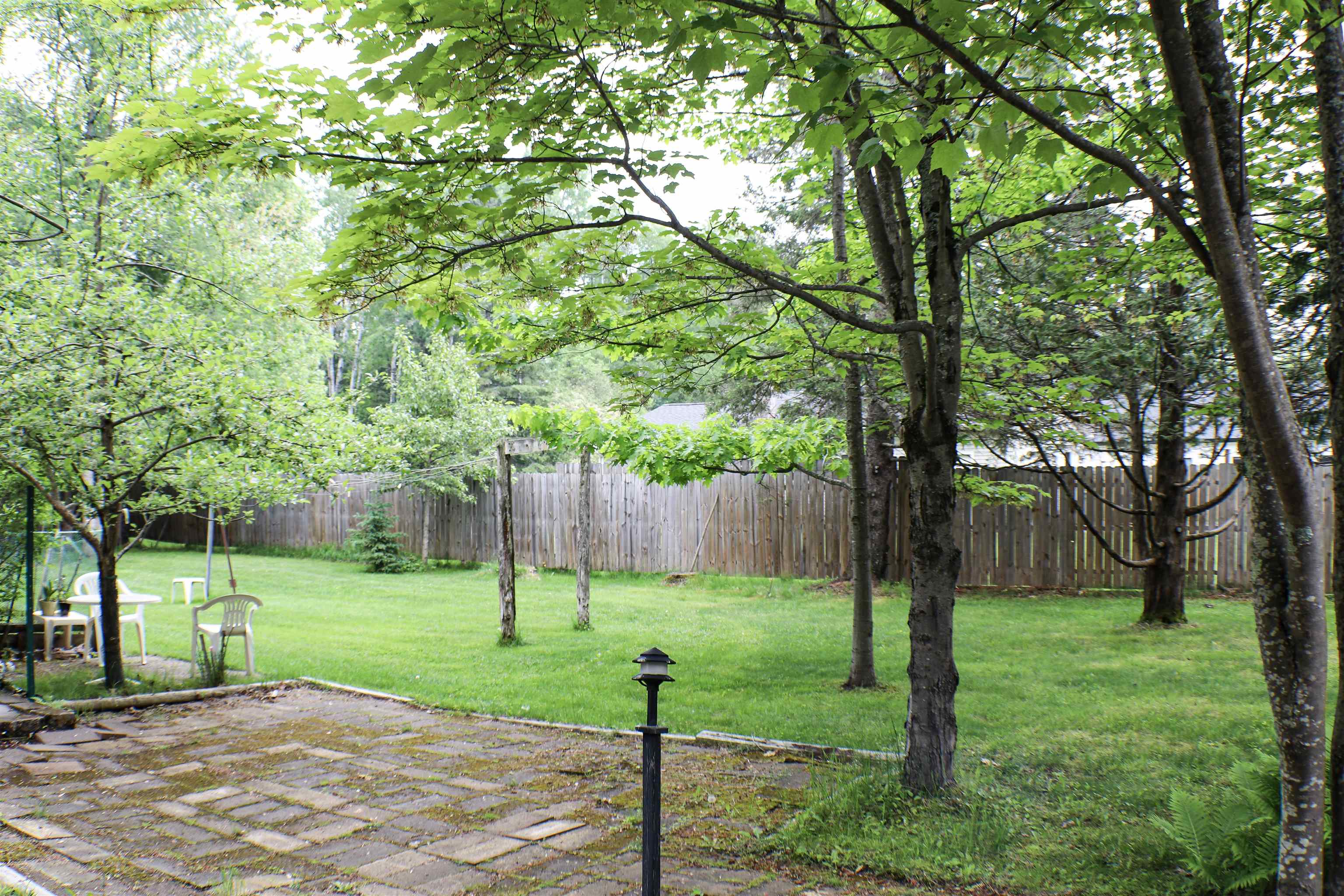 4950 Midway Road Duluth, MN 55811 - Photo 8 of 26 Fenced backyard featuring a patio area
