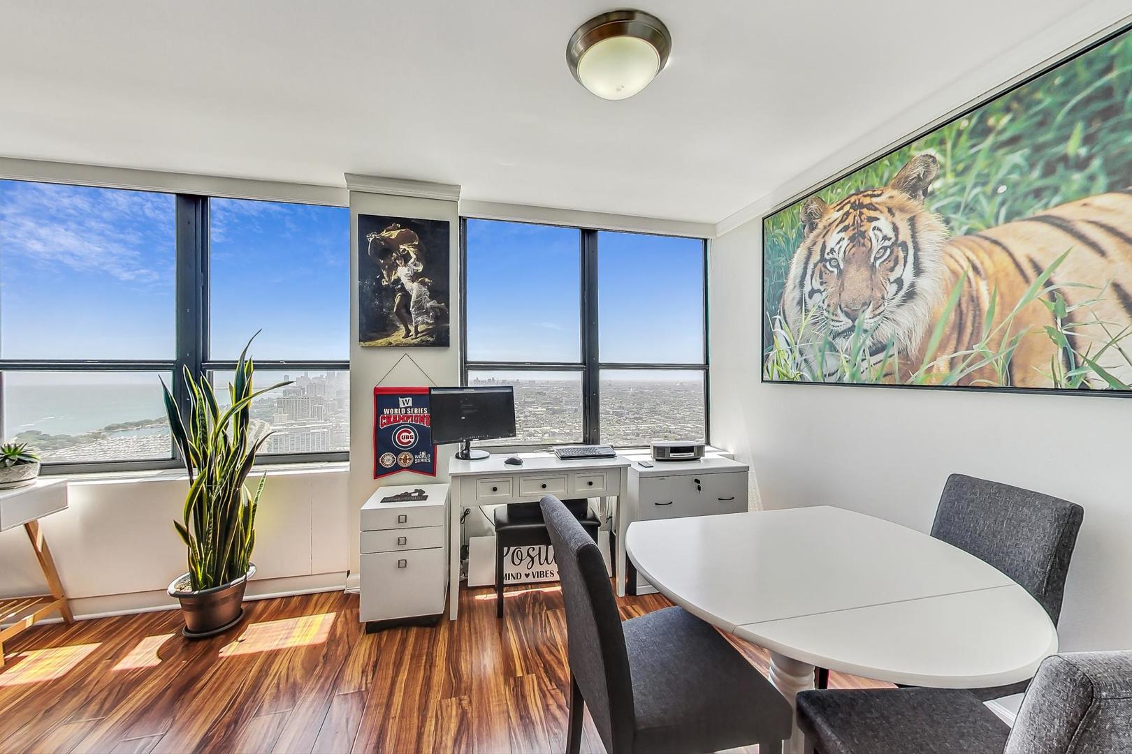 655 West Irving Park Road, Unit 5503 Chicago, IL 60613 - Photo 11 of 32 a workspace with furniture and window