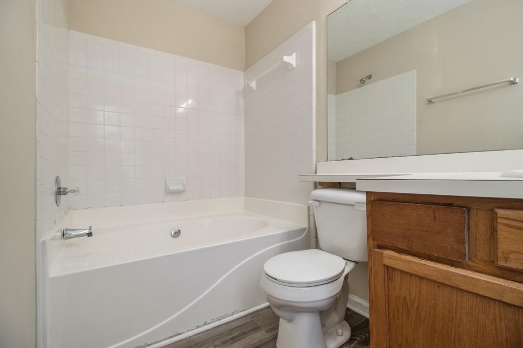 6510 Charter Way Lithonia, GA 30058 - Photo 17 of 27 a bathroom with a sink a toilet and bathtub